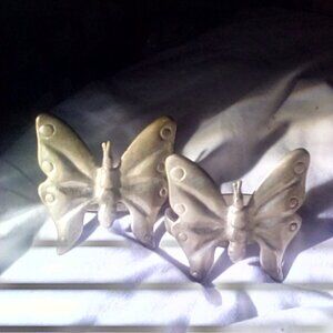 Pair of vintage , brass napkin holders, butterflies